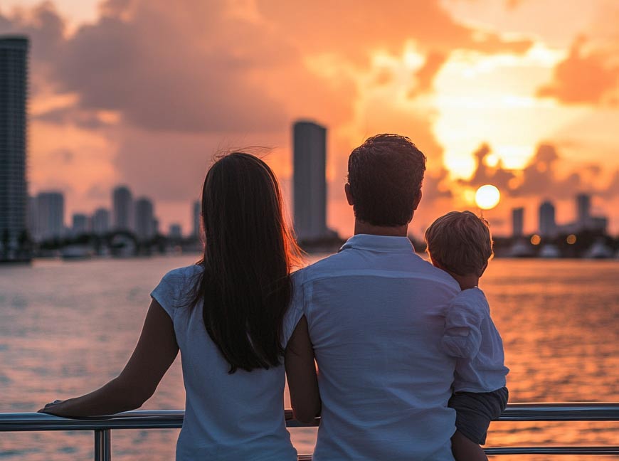 Guests enjoying a sunset NYC landmarks cruise on New York Harbor.